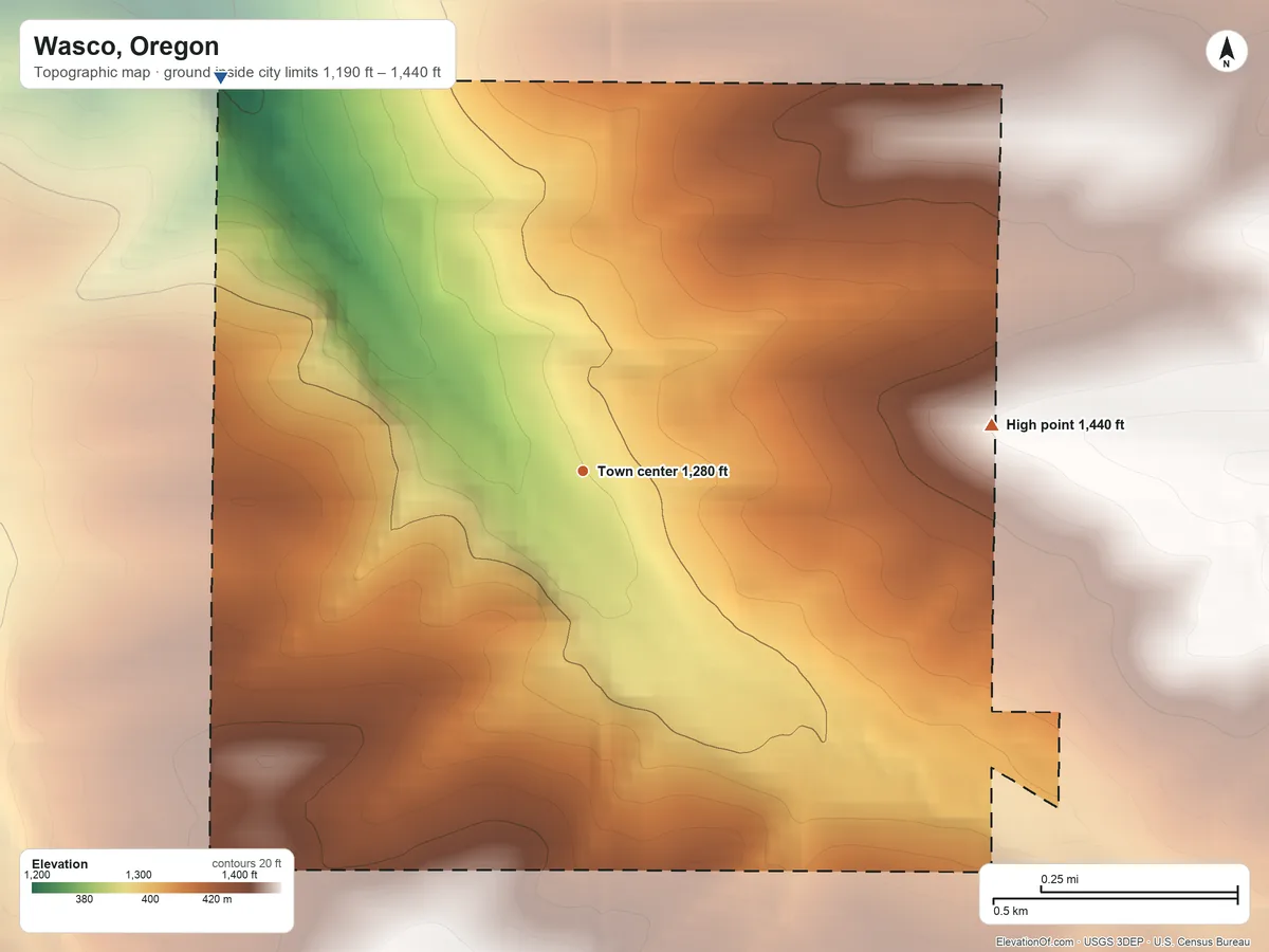 Topographic elevation map of Wasco, Oregon, shaded from 1,190 ft on the northwest side to 1,440 ft on the east side