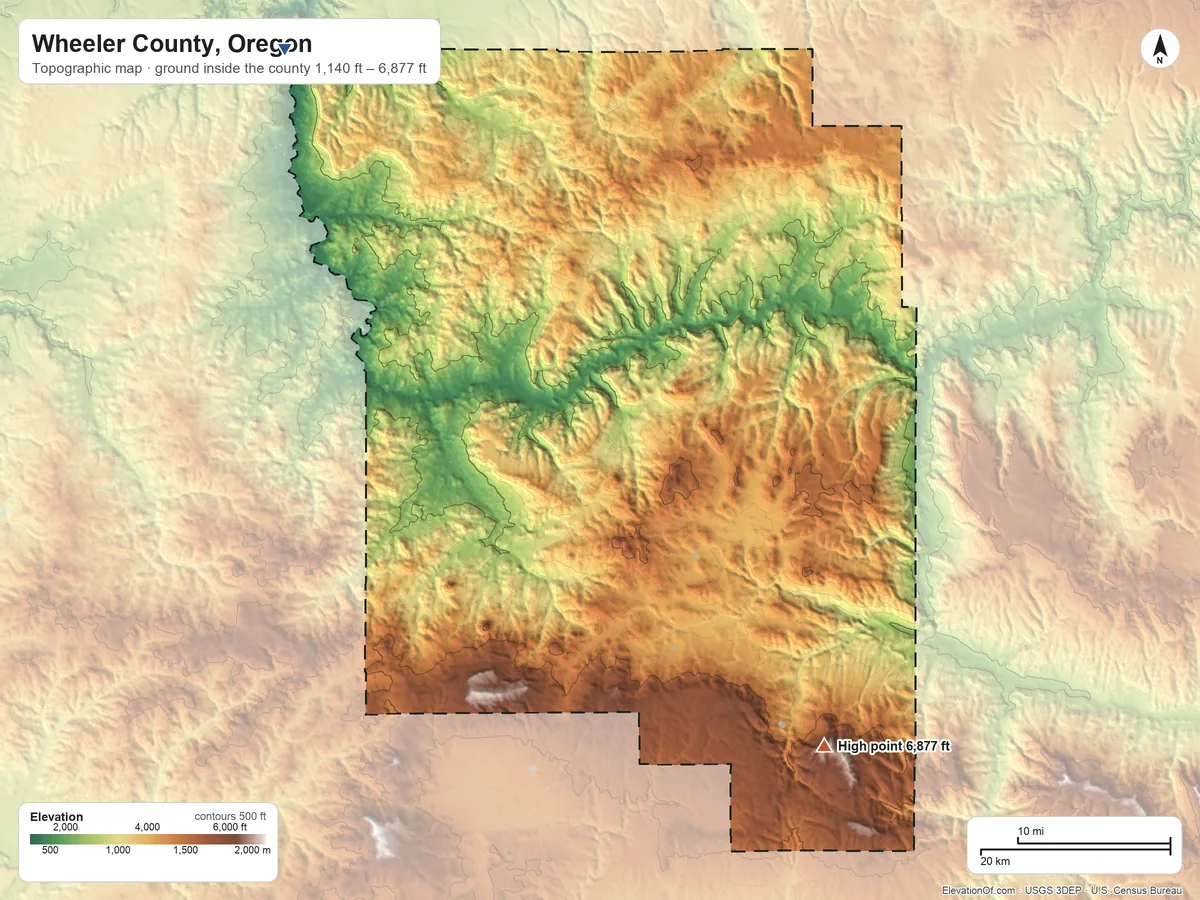 Topographic elevation map of Wheeler County, Oregon, shaded from 1,140 ft on the northwest side to 6,877 ft on Spanish Peak