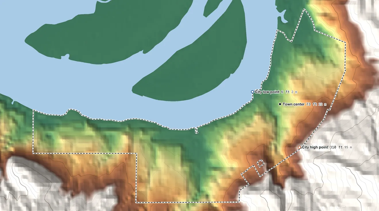 Topographic elevation map of Wheeler, Oregon, shaded from 6 ft near the middle to 310 ft on the southeast edge, below higher ground just outside