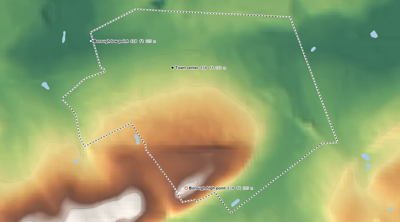 Topographic elevation map of Alburtis, Pennsylvania, shaded from 410 ft on the west side to 610 ft on the south edge, below higher ground just outside