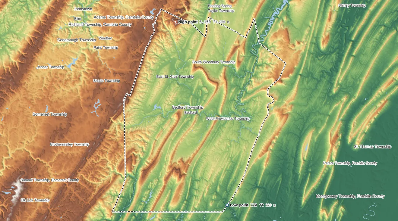 Topographic elevation map of Bedford County, Pennsylvania, shaded from 720 ft on the south side to 3,150 ft on Blue Knob