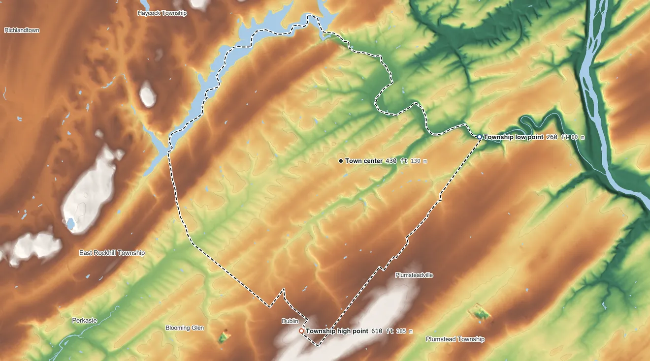 Topographic elevation map of Bedminster Township, Pennsylvania, shaded from 260 ft on the east side to 610 ft on the south side