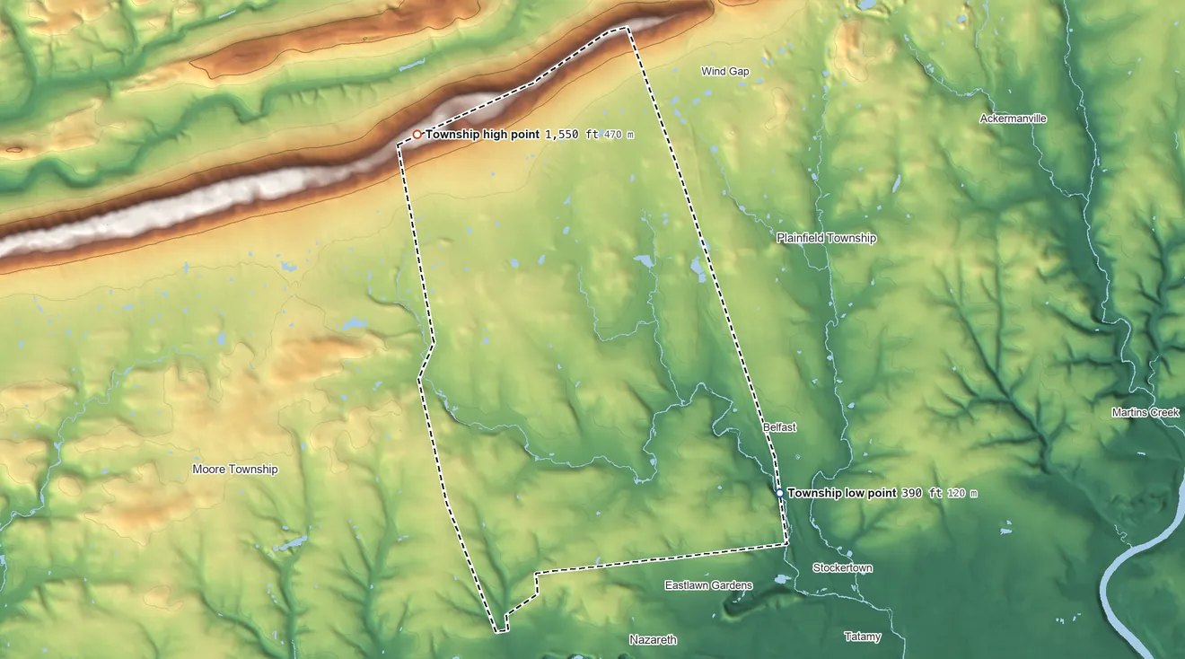Topographic elevation map of Bushkill Township, Pennsylvania, shaded from 390 ft on the southeast side to 1,550 ft on the northwest side