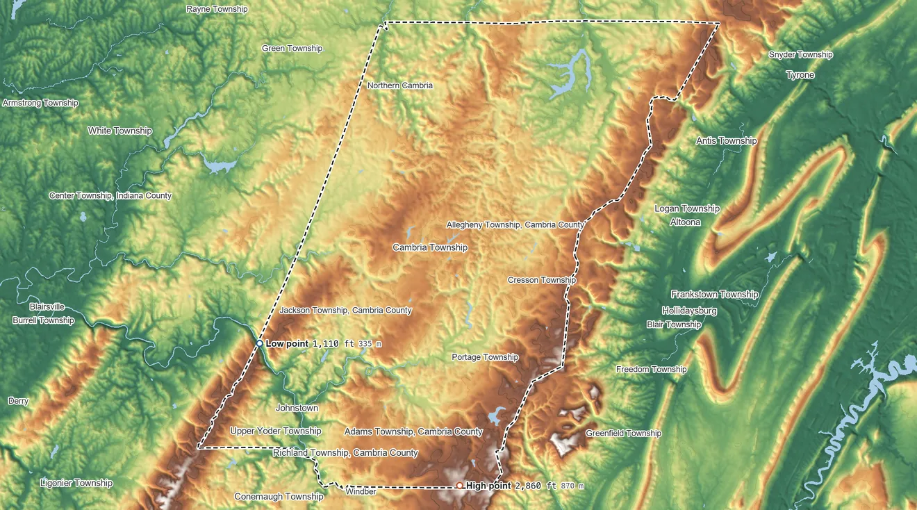 Topographic elevation map of Cambria County, Pennsylvania, shaded from 1,110 ft on the southwest side to 2,860 ft on the south side