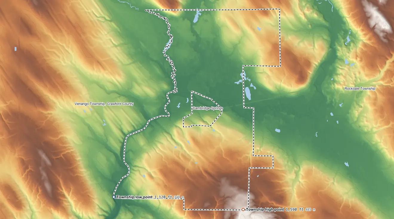 Topographic elevation map of Cambridge Township, Pennsylvania, shaded from 1,120 ft on the southwest side to 1,590 ft on the southeast side