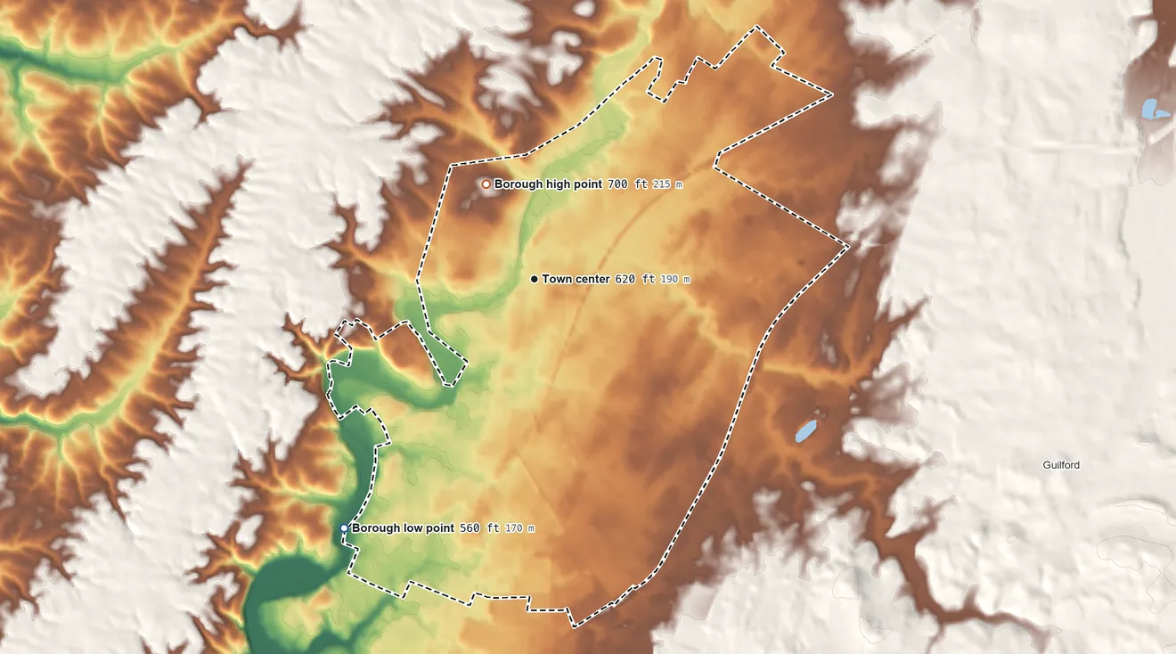 Topographic elevation map of Chambersburg, Pennsylvania, shaded from 560 ft on the southwest side to 700 ft on the northwest side