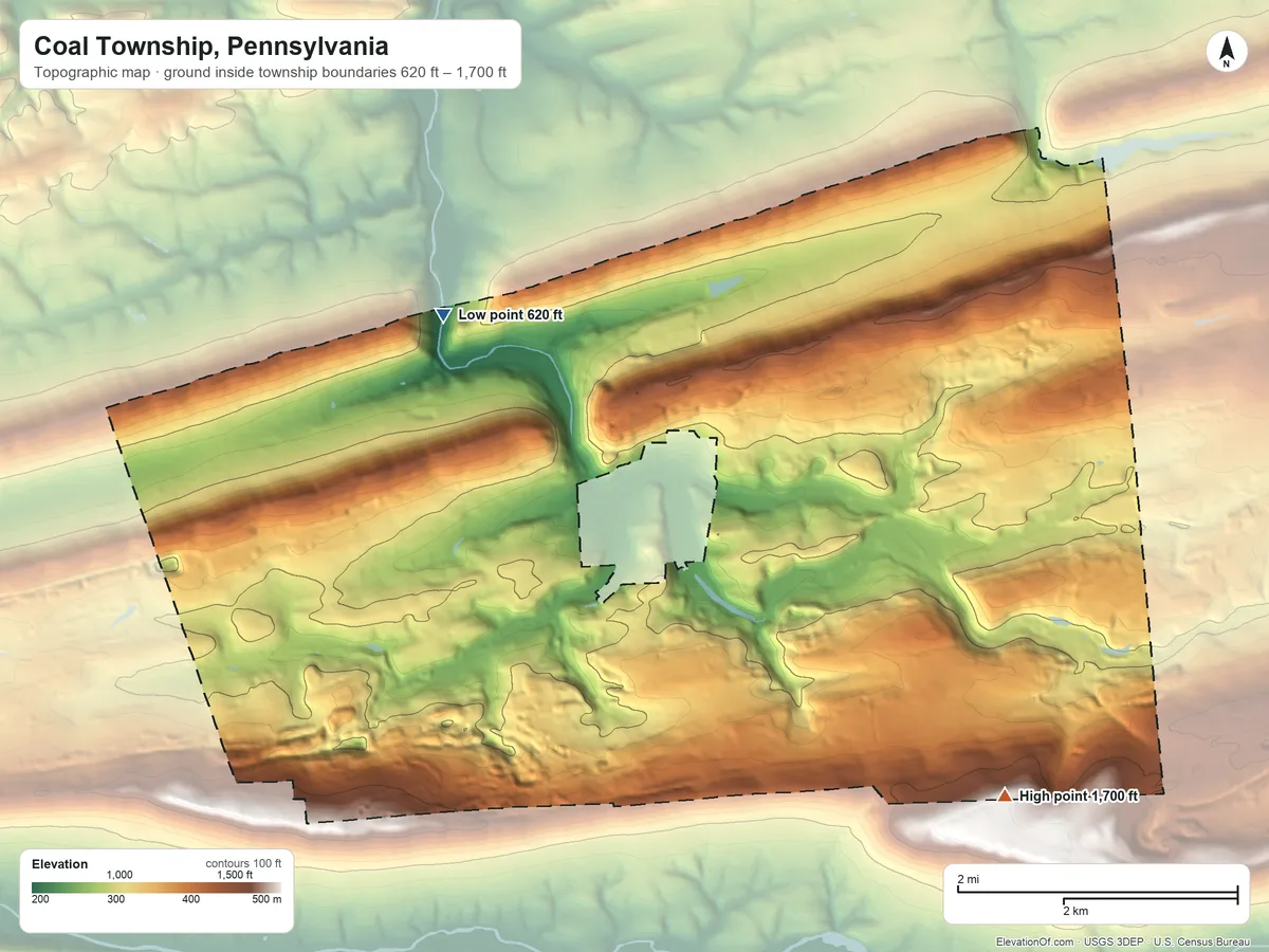 Topographic elevation map of Coal Township, Pennsylvania, shaded from 620 ft on the northwest side to 1,700 ft on the southeast side