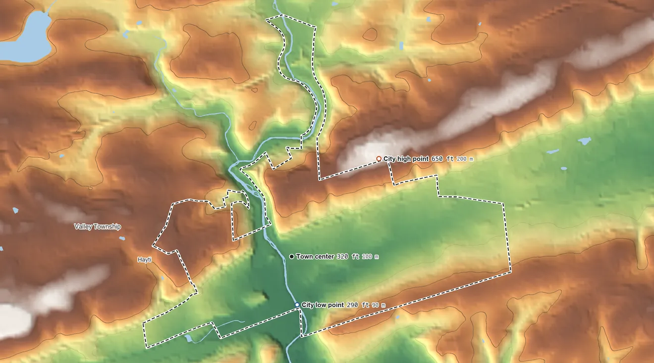 Topographic elevation map of Coatesville, Pennsylvania, shaded from 290 ft near the middle to 650 ft on the northeast side