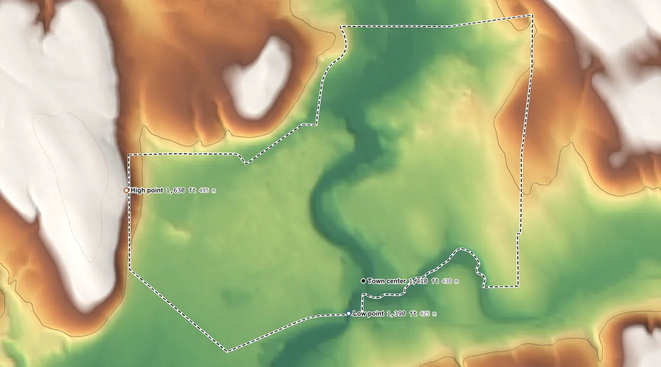 Topographic elevation map of Columbus, Pennsylvania, shaded from 1,390 ft near the middle to 1,630 ft on the west side