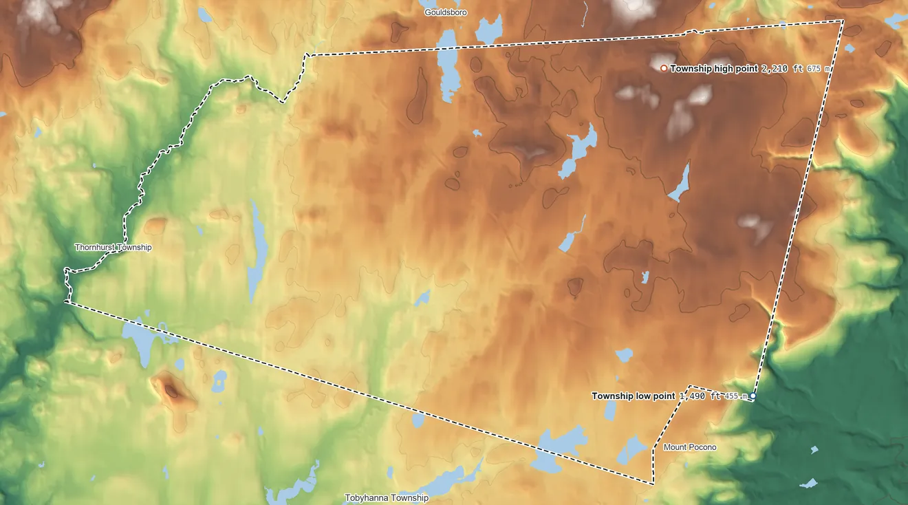 Topographic elevation map of Coolbaugh Township, Pennsylvania, shaded from 1,490 ft on the southeast side to 2,210 ft on the north side