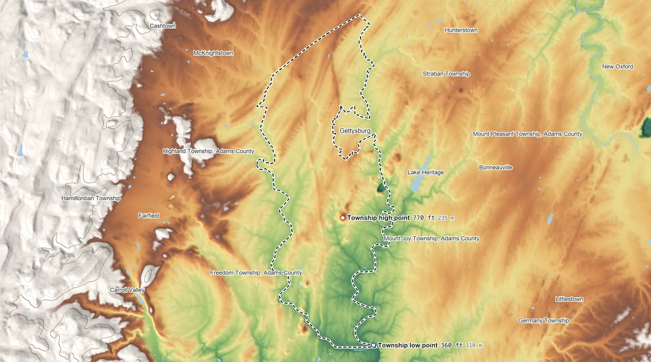 Topographic elevation map of Cumberland Township, Pennsylvania, shaded from 360 ft on the south side to 770 ft on Round Top