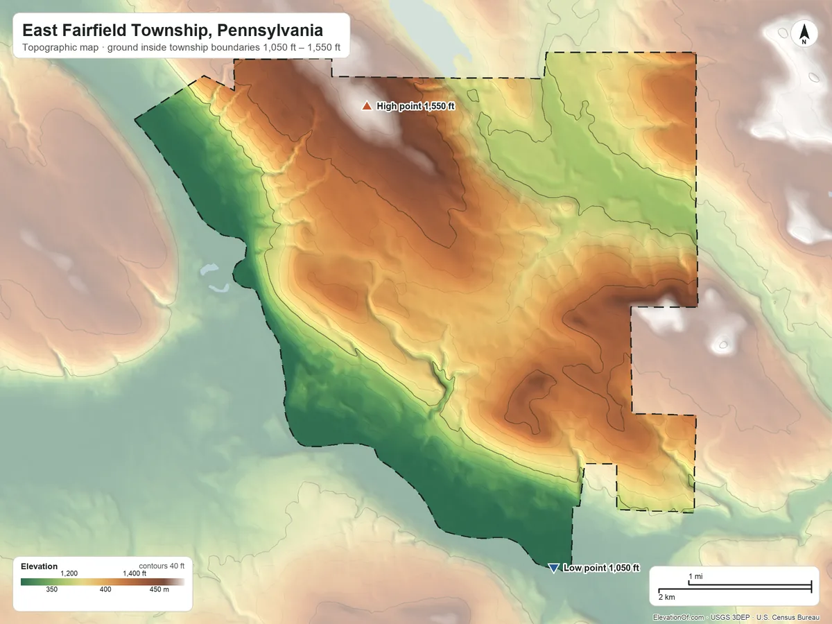Topographic elevation map of East Fairfield Township, Pennsylvania, shaded from 1,050 ft on the southeast side to 1,550 ft on the north side