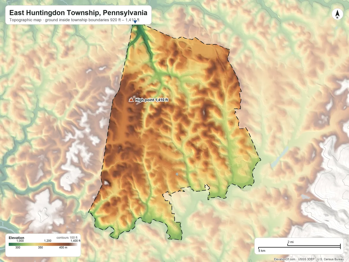 Topographic elevation map of East Huntingdon Township, Pennsylvania, shaded from 920 ft on the north side to 1,410 ft on the northwest side