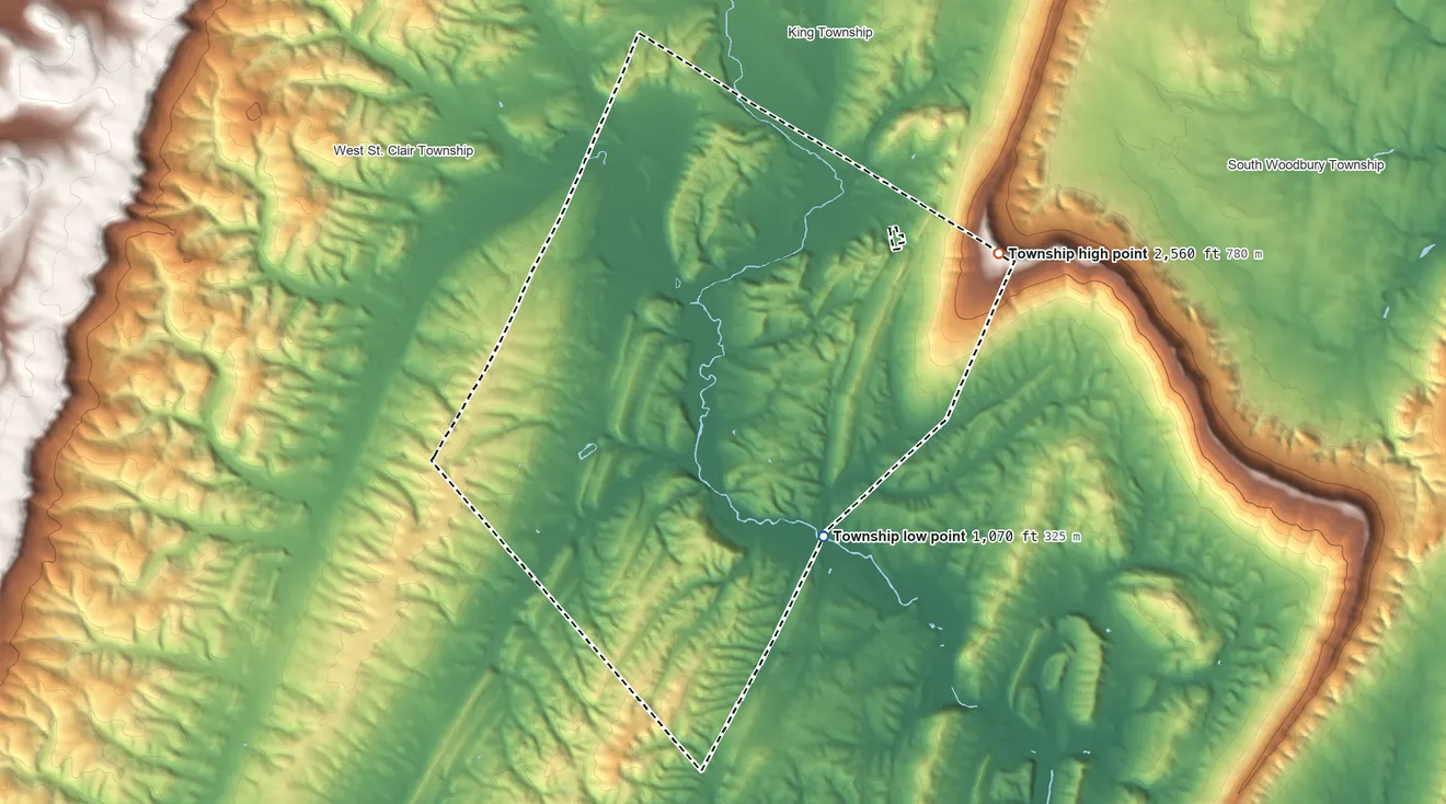 Topographic elevation map of East St. Clair Township, Pennsylvania, shaded from 1,070 ft on the southeast side to 2,560 ft on the northeast side