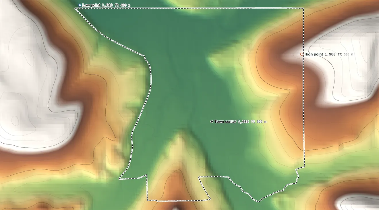 Topographic elevation map of Genesee, Pennsylvania, shaded from 1,610 ft on the northwest side to 1,980 ft on the northeast edge, below higher ground just outside