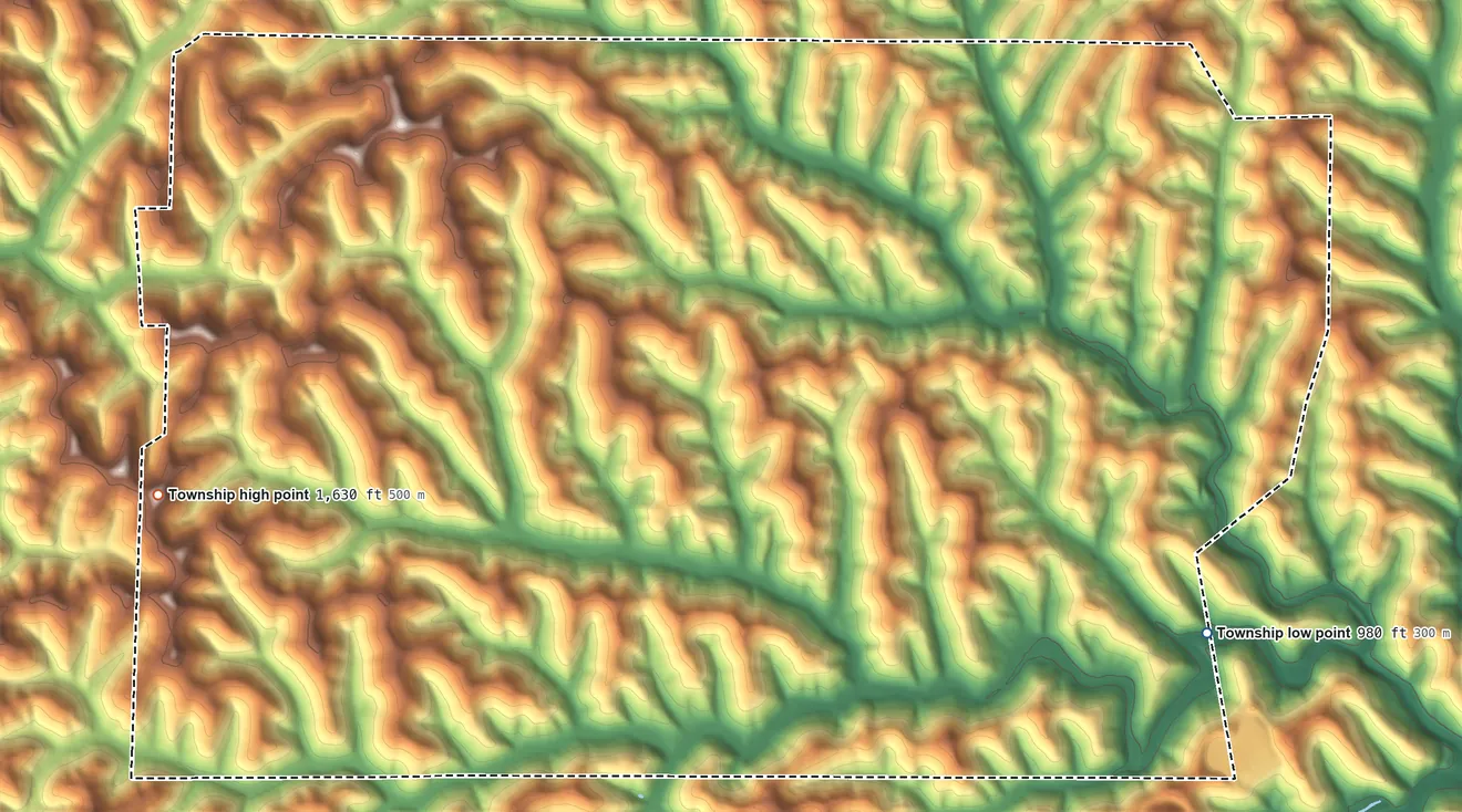 Topographic elevation map of Gilmore Township, Pennsylvania, shaded from 980 ft on the southeast side to 1,630 ft on the west side