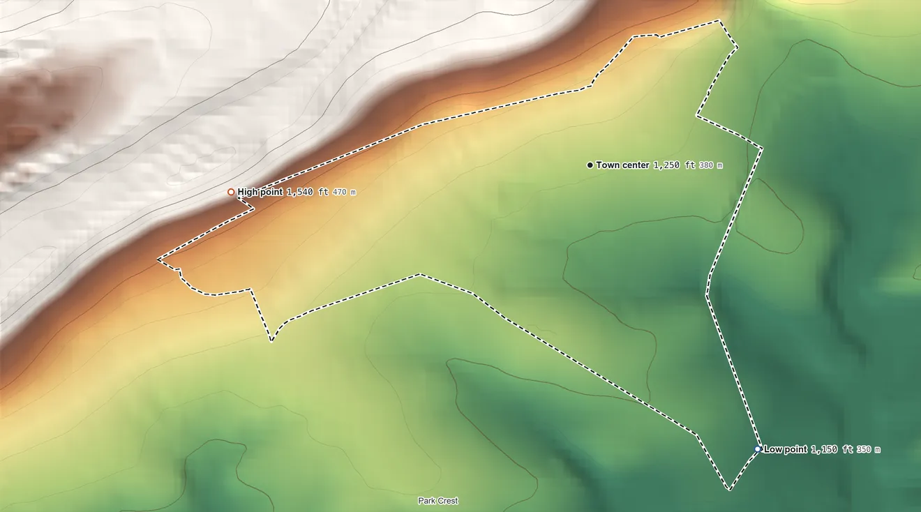 Topographic elevation map of Grier City, Pennsylvania, shaded from 1,150 ft on the southeast side to 1,540 ft at the foot of the Broad Mountain
