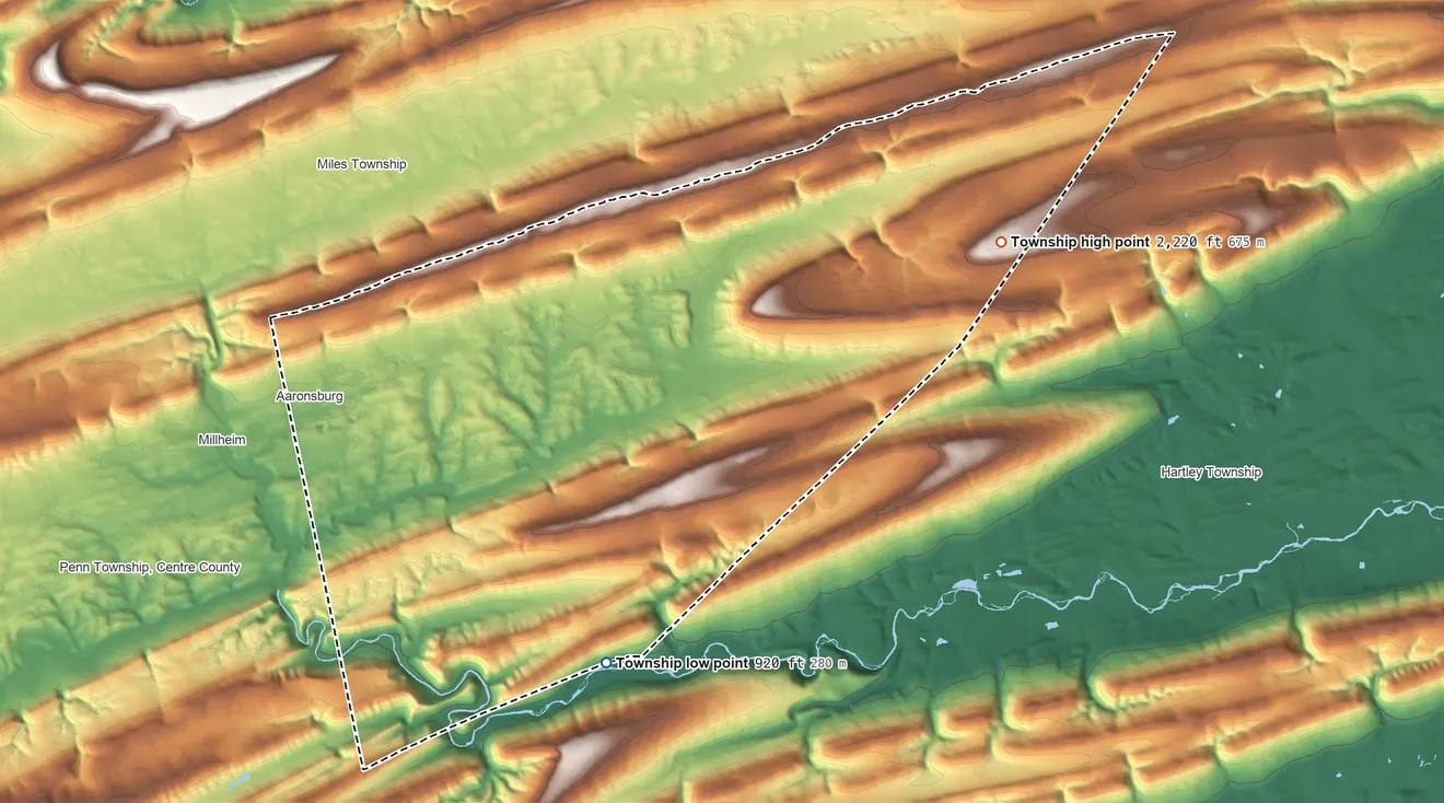 Topographic elevation map of Haines Township, Pennsylvania, shaded from 920 ft on the southeast side to 2,220 ft on Buffalo Mountain