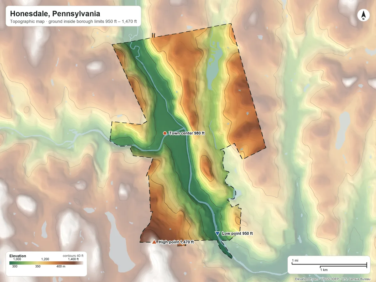 Topographic elevation map of Honesdale, Pennsylvania, shaded from 950 ft on the southeast side to 1,470 ft on the south side