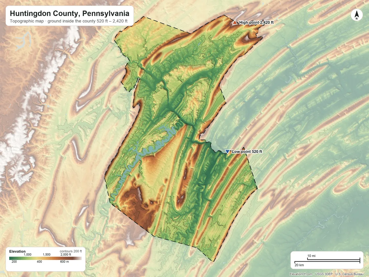 Topographic elevation map of Huntingdon County, Pennsylvania, shaded from 520 ft on the east side to 2,420 ft on Greenlee Mountain
