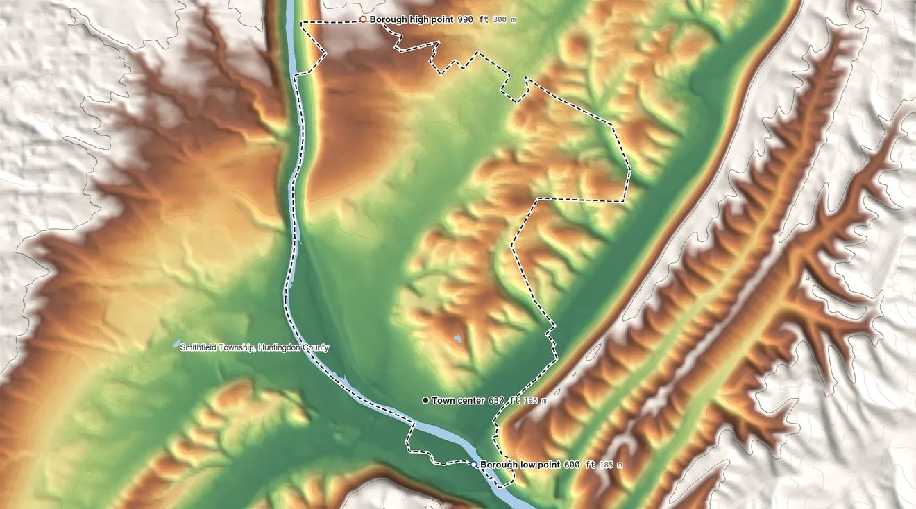 Topographic elevation map of Huntingdon, Pennsylvania, shaded from 600 ft on the southeast side to 990 ft on the north side