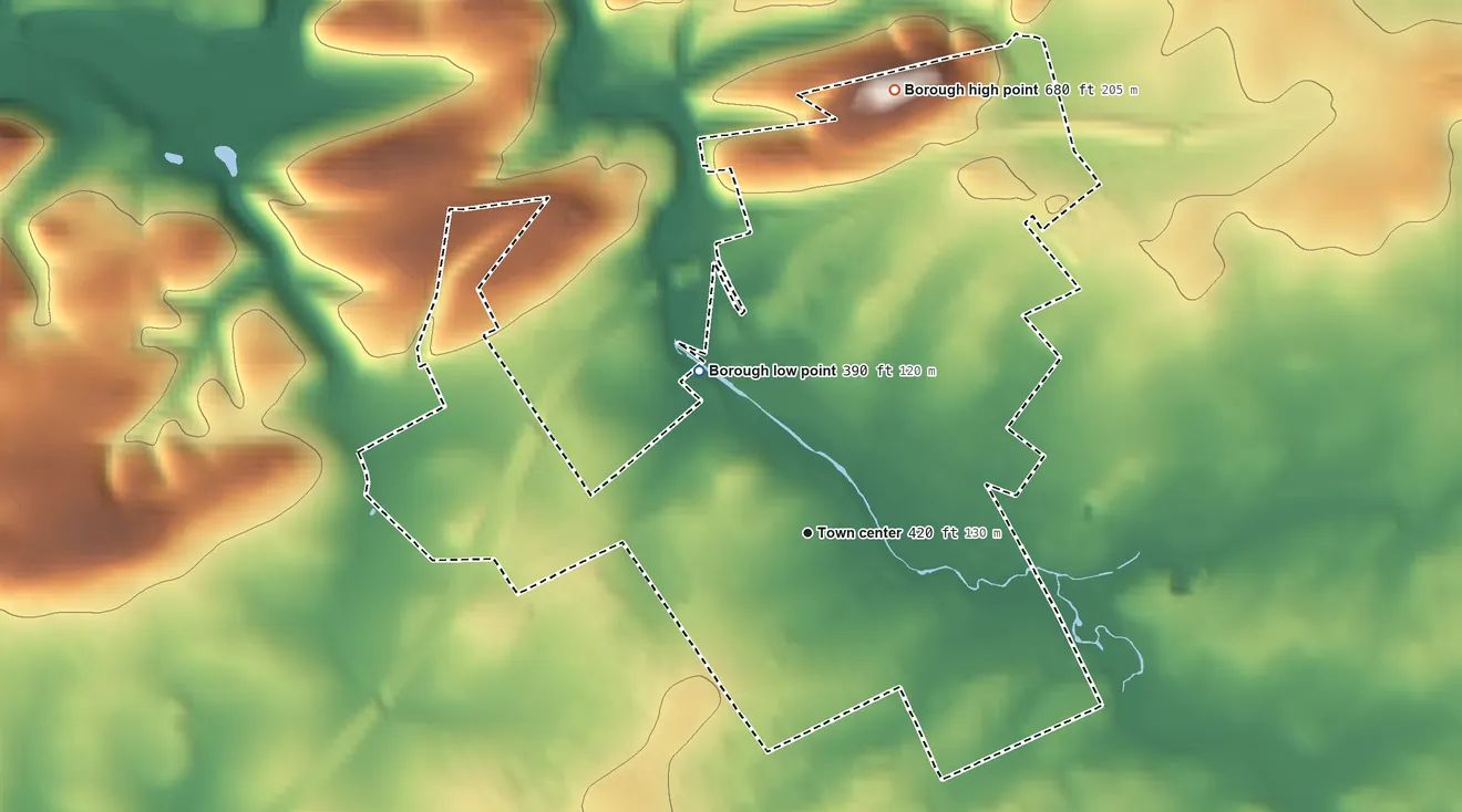 Topographic elevation map of Kutztown, Pennsylvania, shaded from 390 ft on the northwest side to 680 ft on the north side