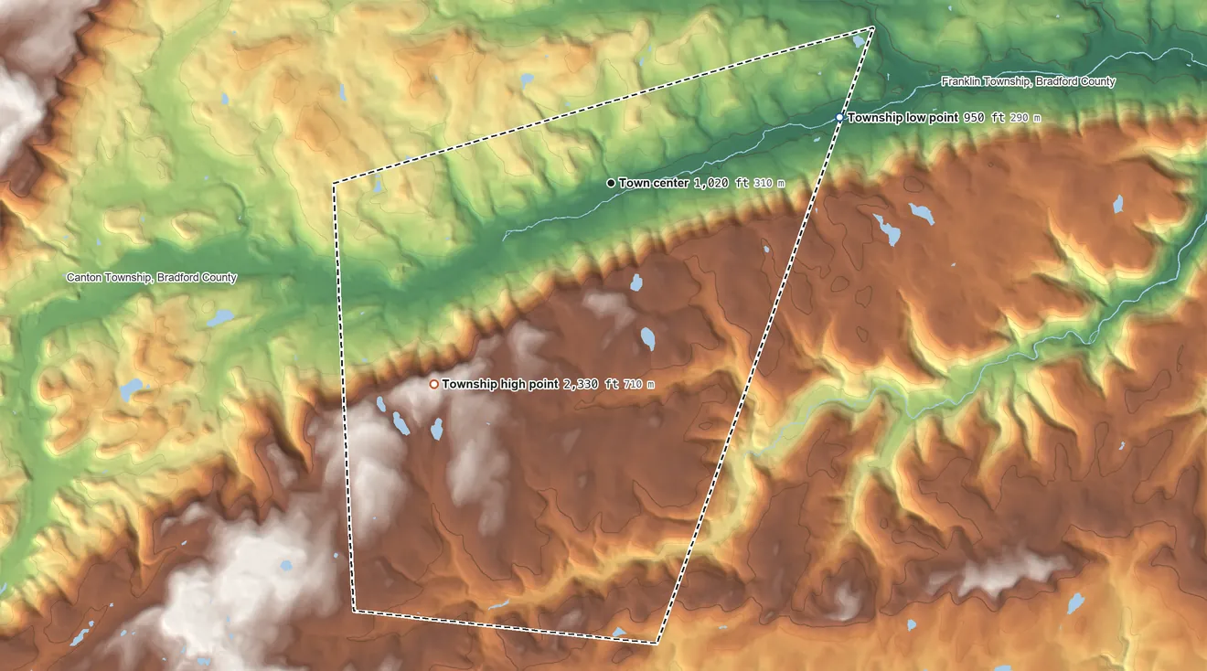 Topographic elevation map of Leroy Township, Pennsylvania, shaded from 950 ft on the east side to 2,330 ft on the southwest side