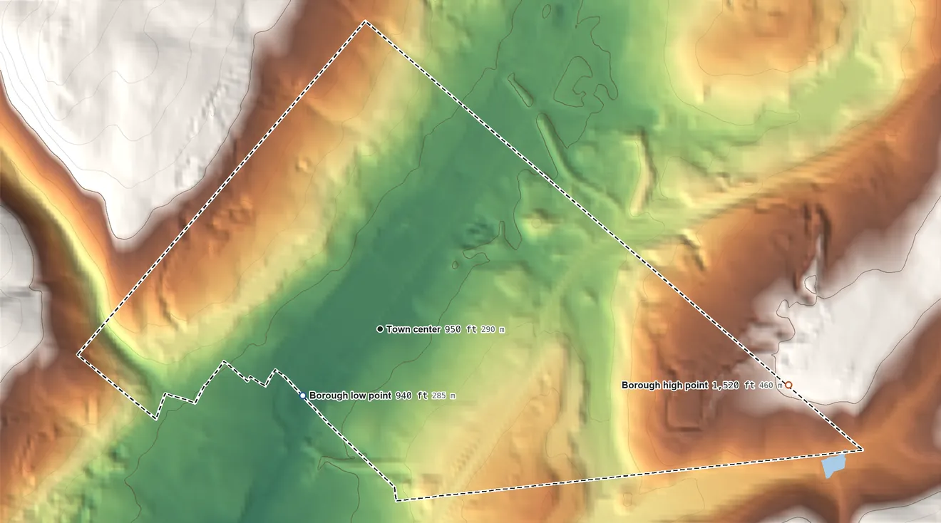 Topographic elevation map of Mayfield, Pennsylvania, shaded from 940 ft on the southwest side to 1,520 ft at the foot of the Moosic Mountains