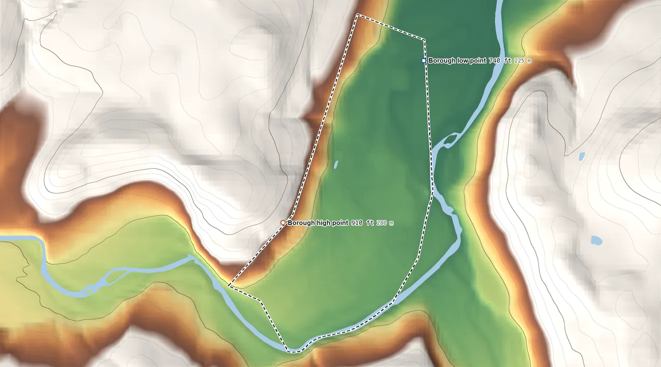 Topographic elevation map of Monroe, Pennsylvania, shaded from 740 ft on the northeast side to 910 ft on the west edge, below higher ground just outside