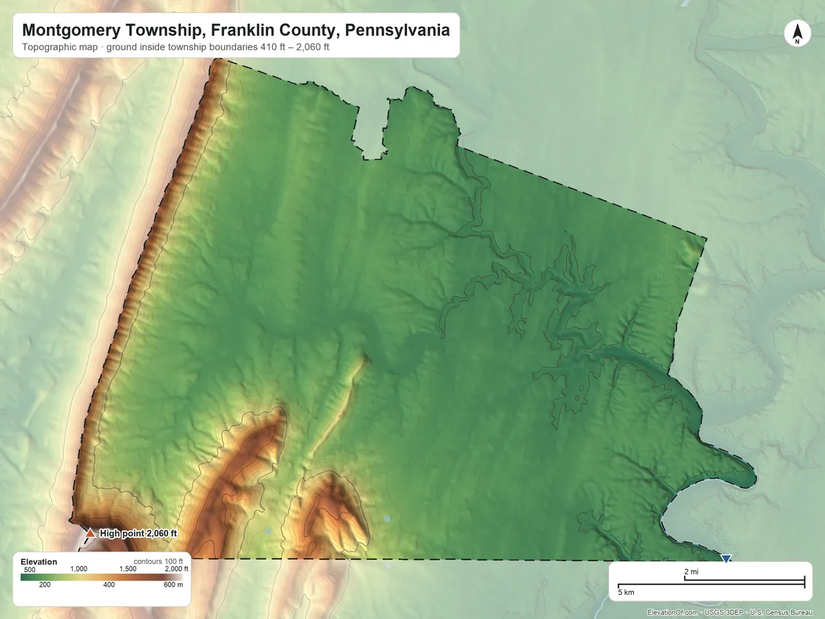 Topographic elevation map of Montgomery Township, Franklin County, Pennsylvania, shaded from 410 ft on the southeast side to 2,060 ft on Cross Mountain