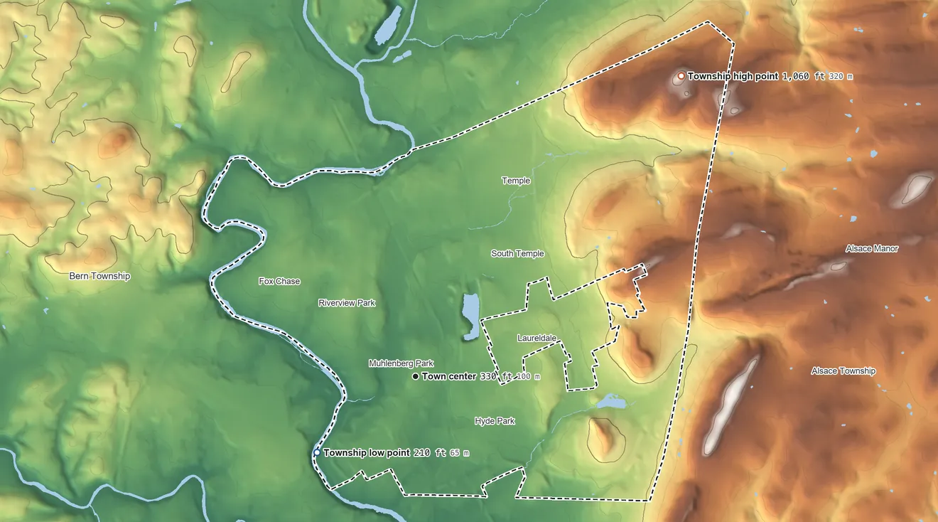 Topographic elevation map of Muhlenberg Township, Pennsylvania, shaded from 210 ft on the southwest side to 1,060 ft on Irish Mountain