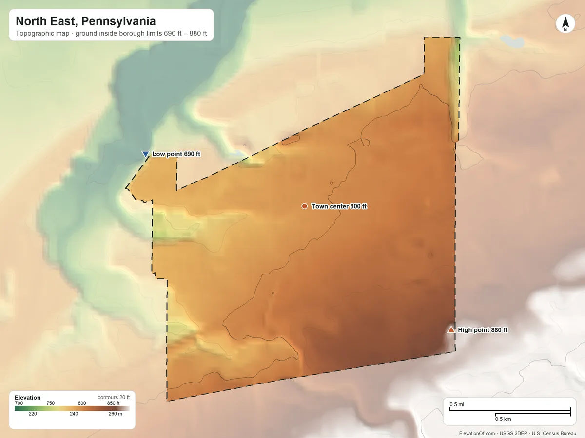 Topographic elevation map of North East, Pennsylvania, shaded from 690 ft on the west side to 880 ft at the foot of the Drumlins