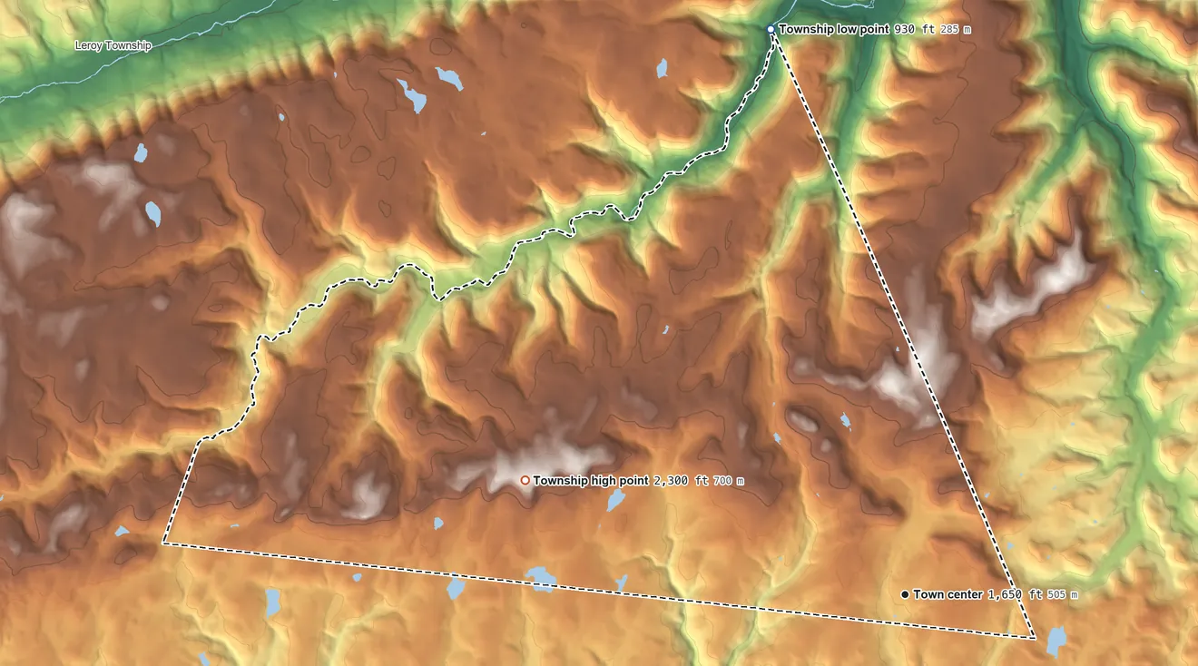 Topographic elevation map of Overton Township, Pennsylvania, shaded from 930 ft on the north side to 2,300 ft on Cahill Mountain