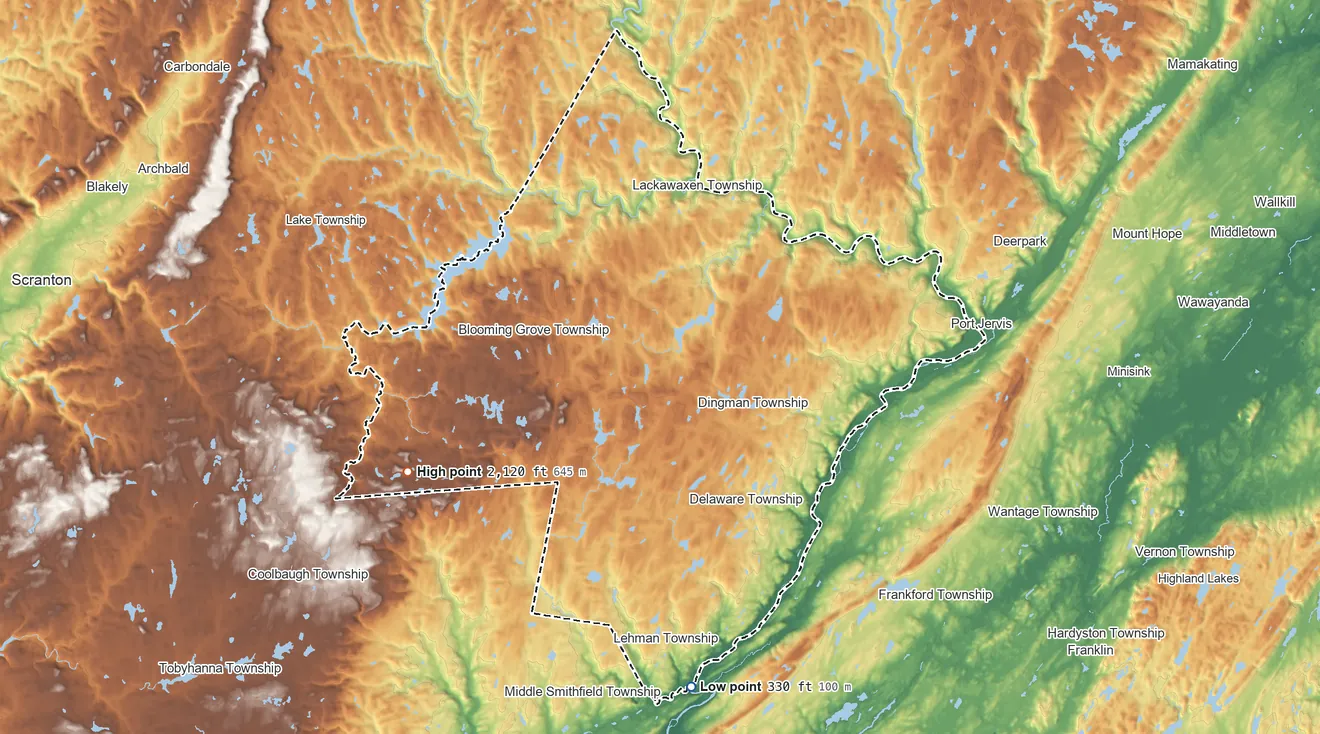 Topographic elevation map of Pike County, Pennsylvania, shaded from 330 ft on the south side to 2,120 ft on the west side