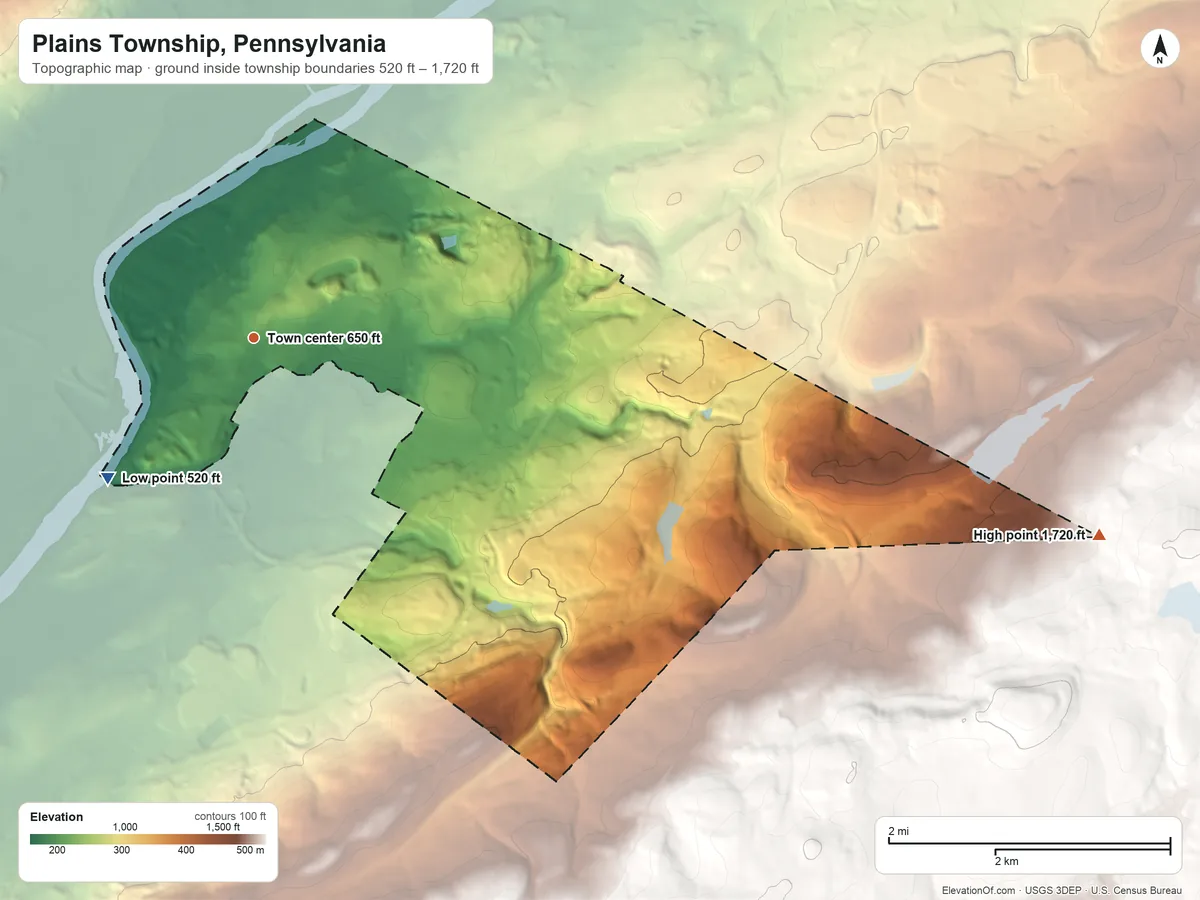 Topographic elevation map of Plains Township, Pennsylvania, shaded from 520 ft on the southwest side to 1,720 ft on the east edge, below higher ground just outside