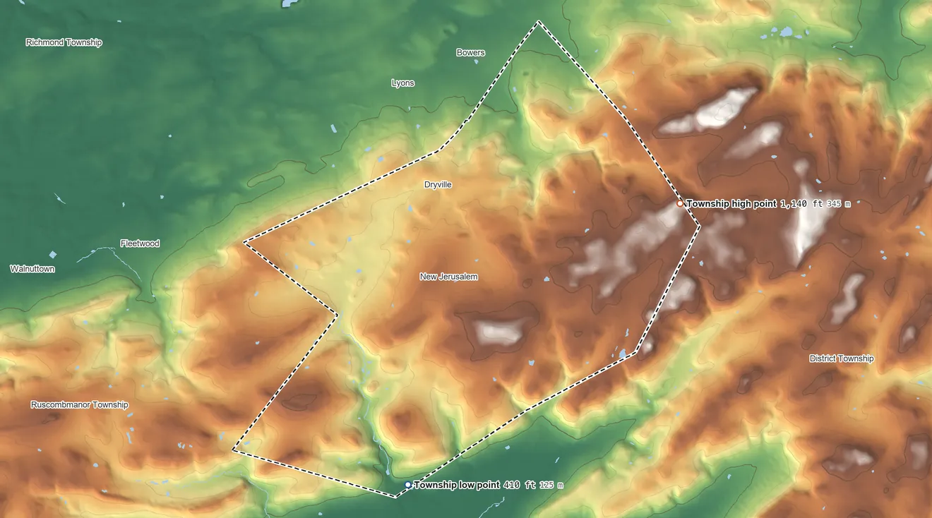 Topographic elevation map of Rockland Township, Pennsylvania, shaded from 410 ft on the south side to 1,140 ft on the east side
