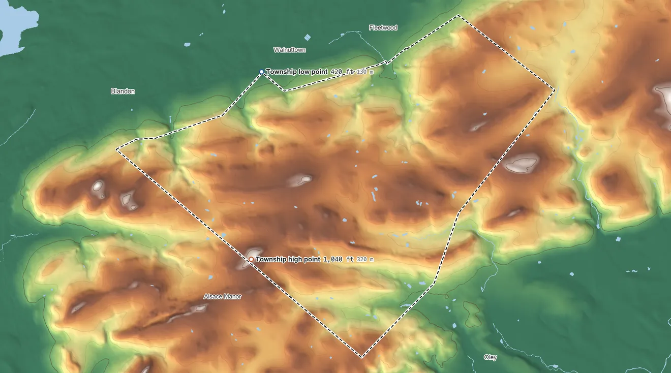 Topographic elevation map of Ruscombmanor Township, Pennsylvania, shaded from 420 ft on the northwest side to 1,040 ft on the southwest side