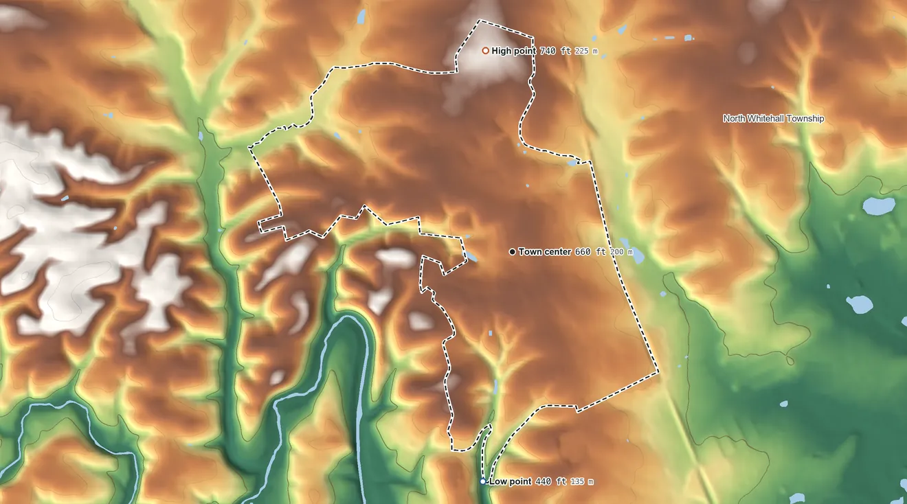 Topographic elevation map of Schnecksville, Pennsylvania, shaded from 440 ft on the south side to 740 ft on the north side