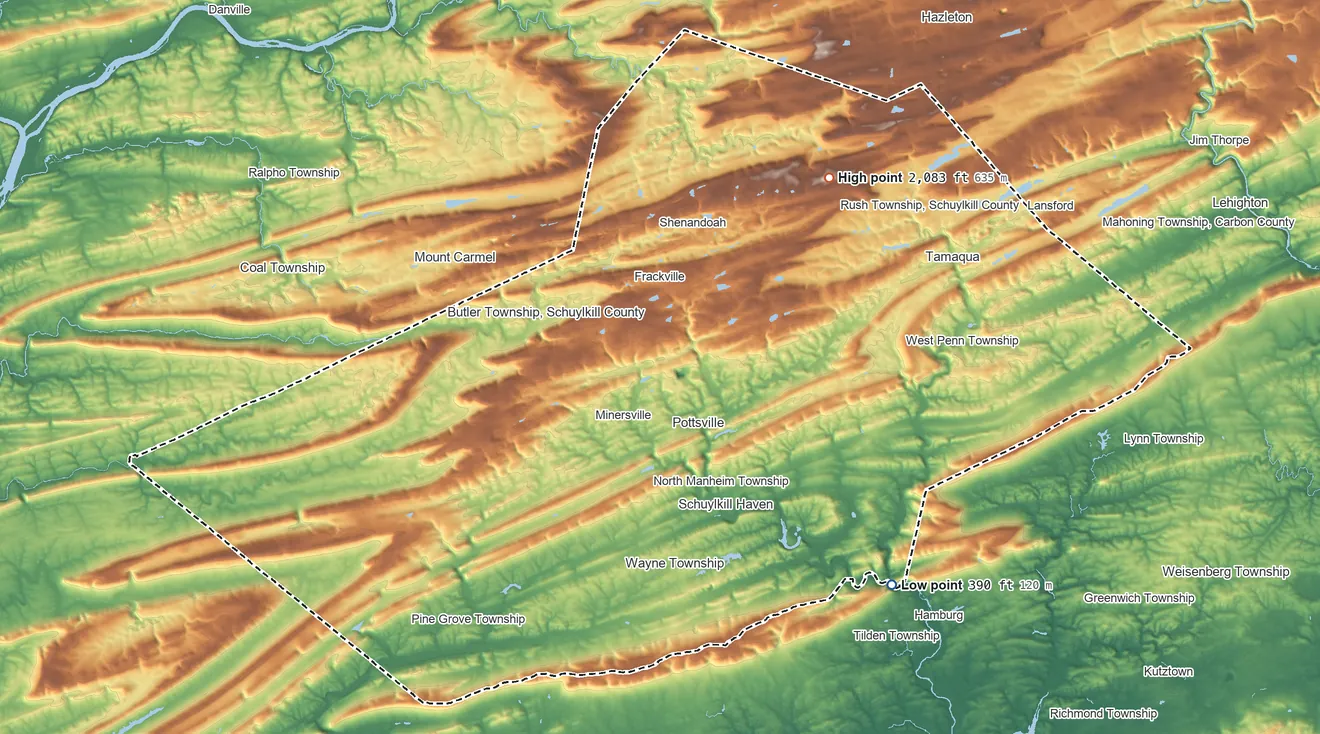 Topographic elevation map of Schuylkill County, Pennsylvania, shaded from 390 ft on the southeast side to 2,083 ft on Bears Head