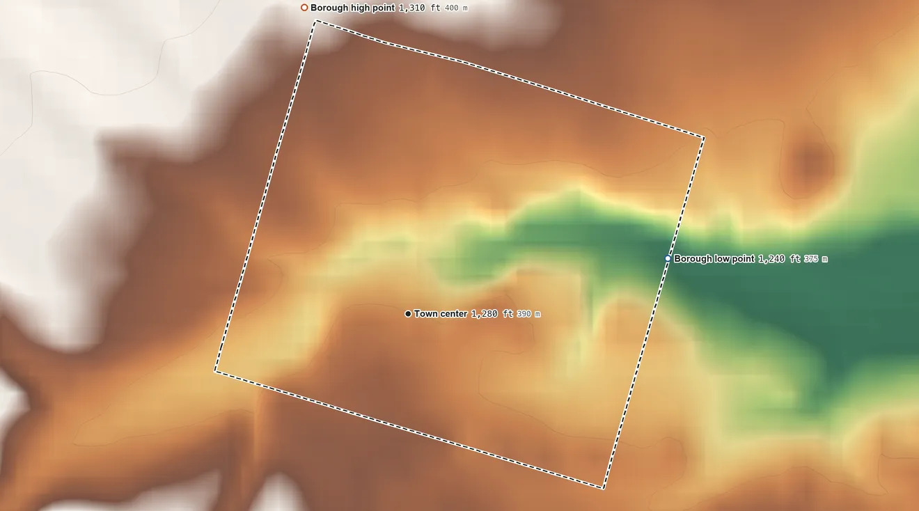 Topographic elevation map of Sheakleyville, Pennsylvania, shaded from 1,240 ft on the east side to 1,310 ft on the north side