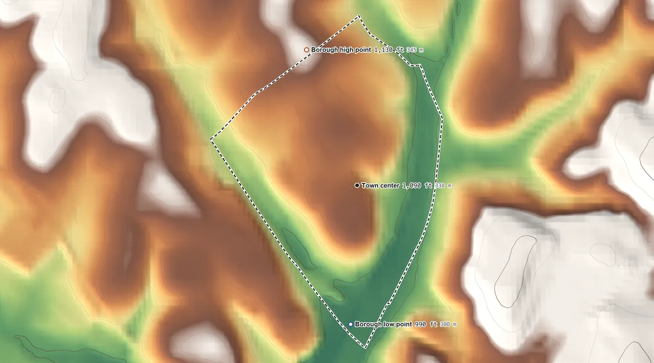 Topographic elevation map of Southwest Greensburg, Pennsylvania, shaded from 990 ft on the south side to 1,130 ft on the north side