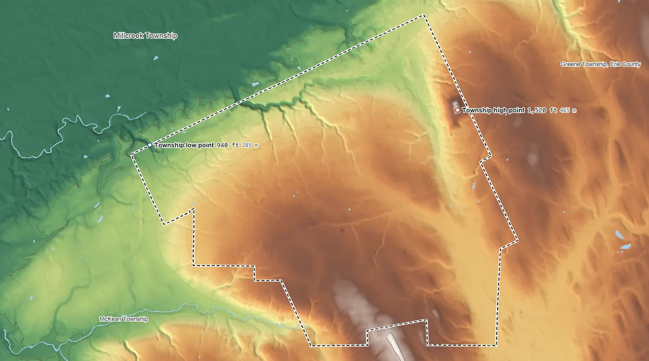 Topographic elevation map of Summit Township, Pennsylvania, shaded from 940 ft on the west side to 1,520 ft on the northeast side