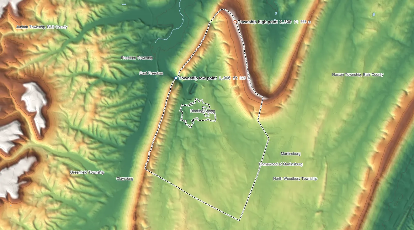Topographic elevation map of Taylor Township, Pennsylvania, shaded from 1,060 ft on the northwest side to 2,500 ft on Loop Mountain