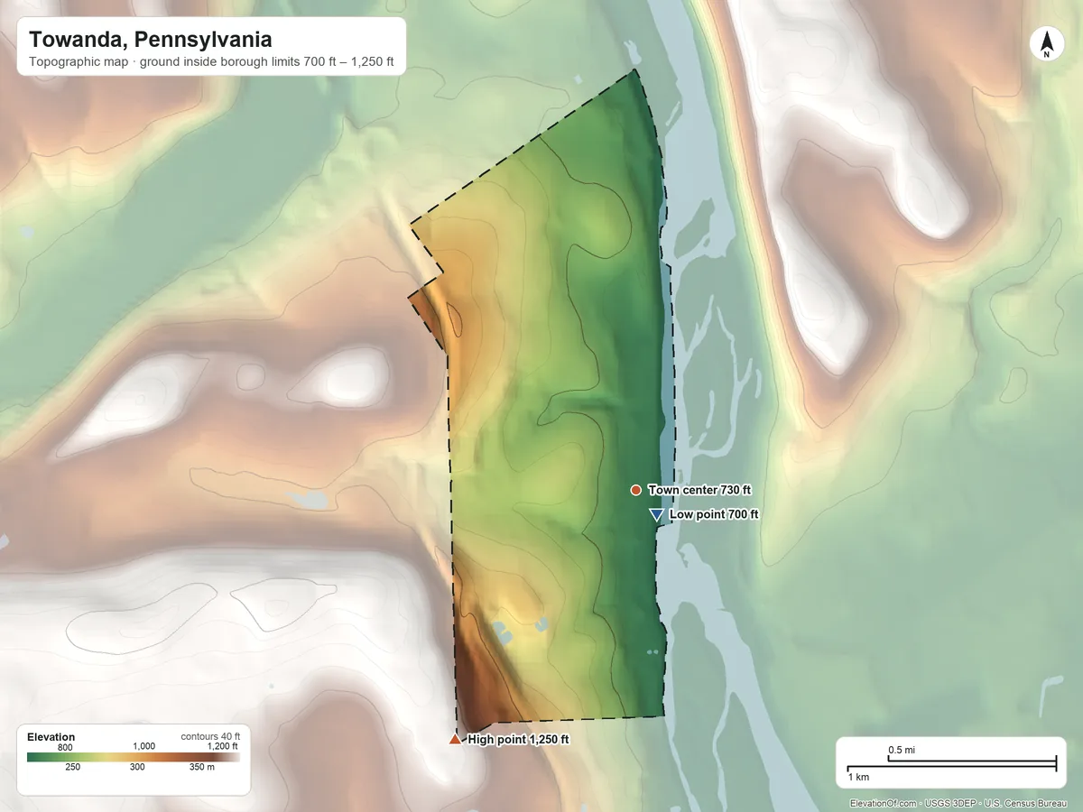 Topographic elevation map of Towanda, Pennsylvania, shaded from 700 ft near the middle to 1,250 ft on the southwest side