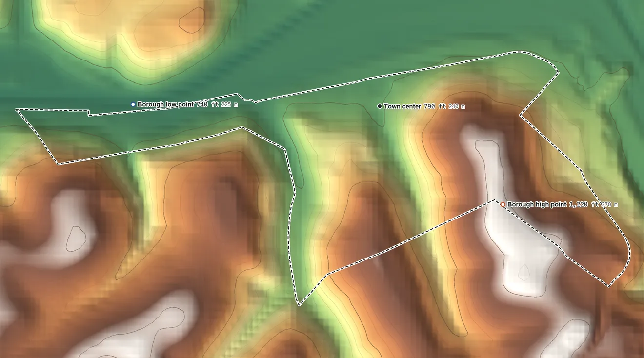 Topographic elevation map of Wall, Pennsylvania, shaded from 740 ft on the west side to 1,220 ft on the southeast side
