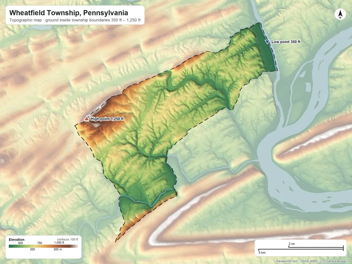 Topographic elevation map of Wheatfield Township, Pennsylvania, shaded from 350 ft on the northeast side to 1,250 ft on the west side