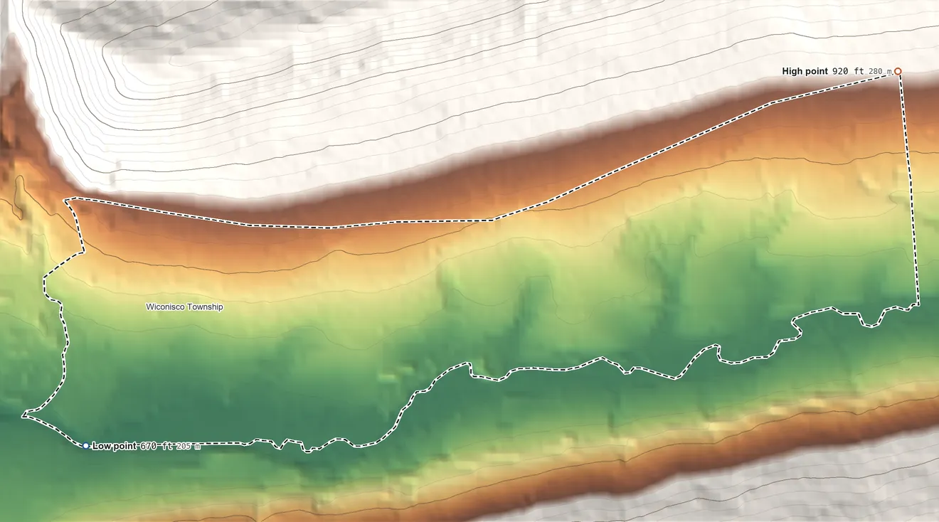 Topographic elevation map of Wiconsico, Pennsylvania, shaded from 670 ft on the southwest side to 920 ft on the east edge, below higher ground just outside