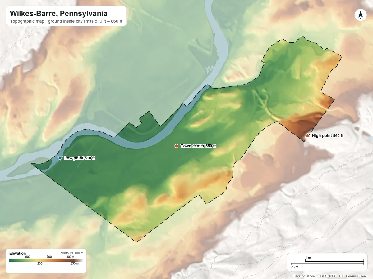 Topographic elevation map of Wilkes-Barre, Pennsylvania, shaded from 510 ft on the west side to 860 ft on the east edge, below higher ground just outside