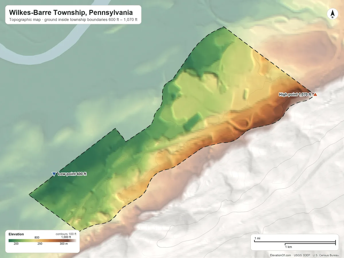 Topographic elevation map of Wilkes-Barre Township, Pennsylvania, shaded from 600 ft on the west side to 1,070 ft on the east edge, below higher ground just outside