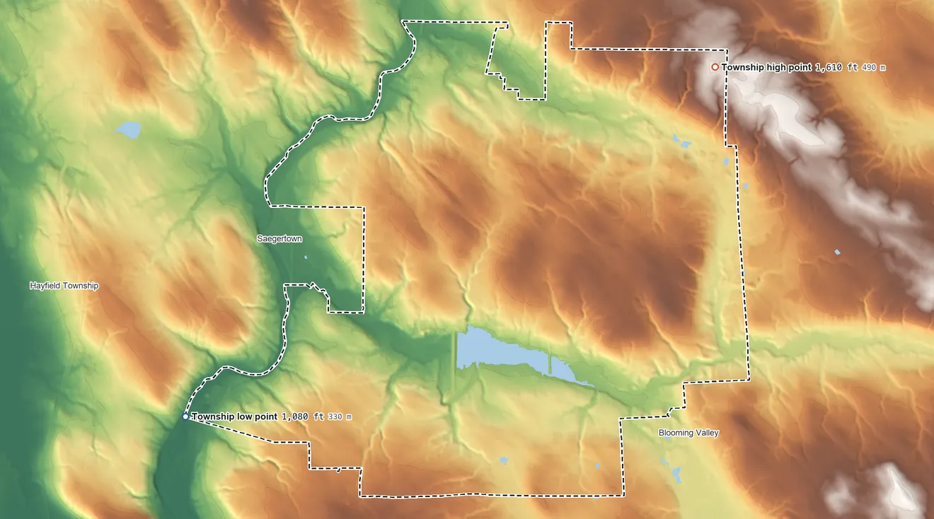 Topographic elevation map of Woodcock Township, Pennsylvania, shaded from 1,080 ft on the southwest side to 1,610 ft on the northeast side